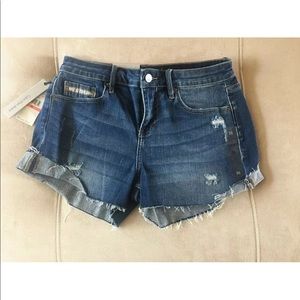 Calvin Klein mid-dark wash jean shorts